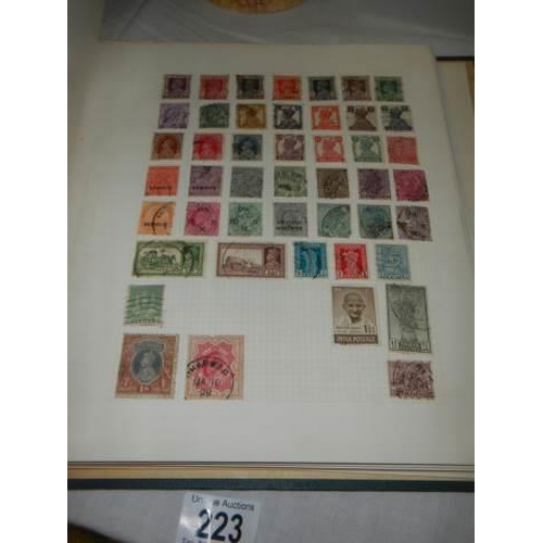 223 - A album of postage stamps.