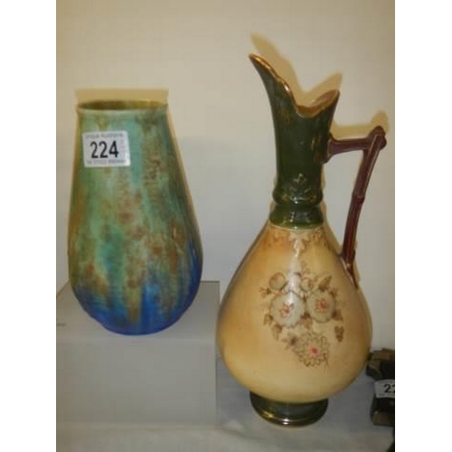 224 - Two ceramic jugs and a vase.