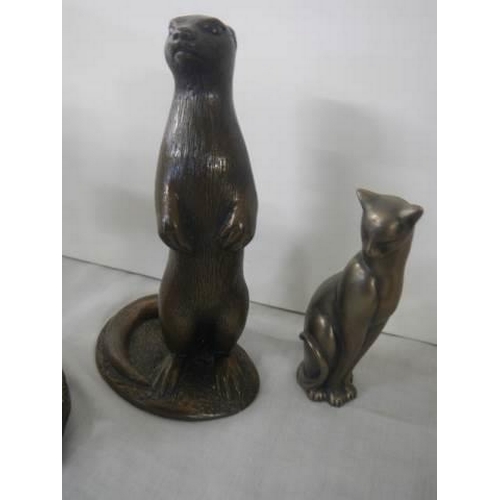 232 - Four animal figures - dog, cat, otter and kiwi.