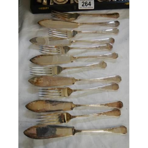 264 - A cased desert set and a quantity of fish knives and forks.