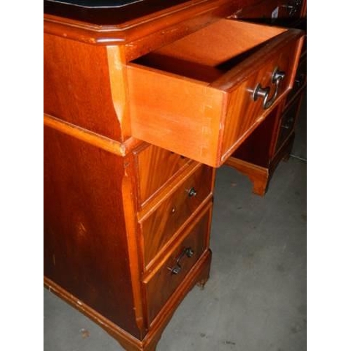 281 - A mahogany kneehole desk, COLLECT ONLY.