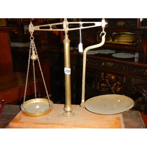 299 - A set of brass balance scales.