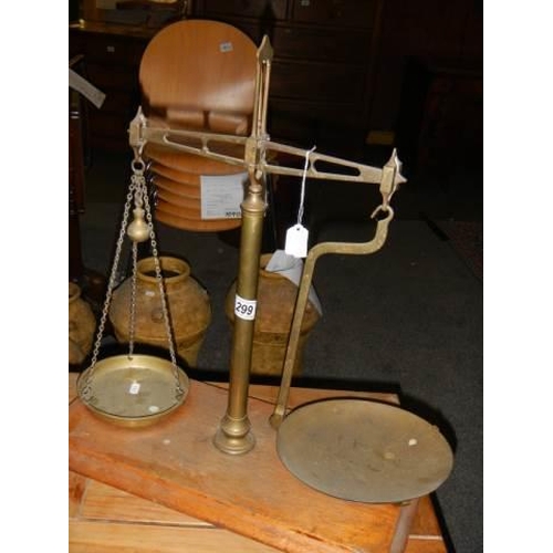 299 - A set of brass balance scales.