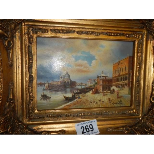 269 - A gilt framed Venetian scene.