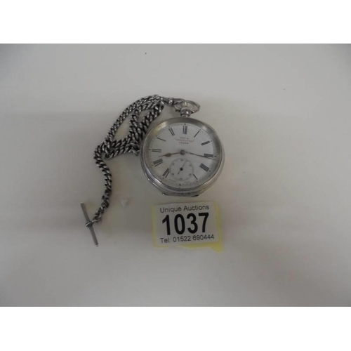 1037 - A Kays silver pocket watch on a silver chain, in working order.