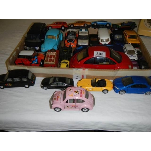 302 - A mixed lot of die cast vehicles.