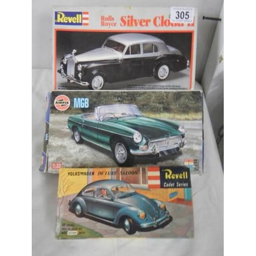 305 - Two Revell and one Airfix model car kits.