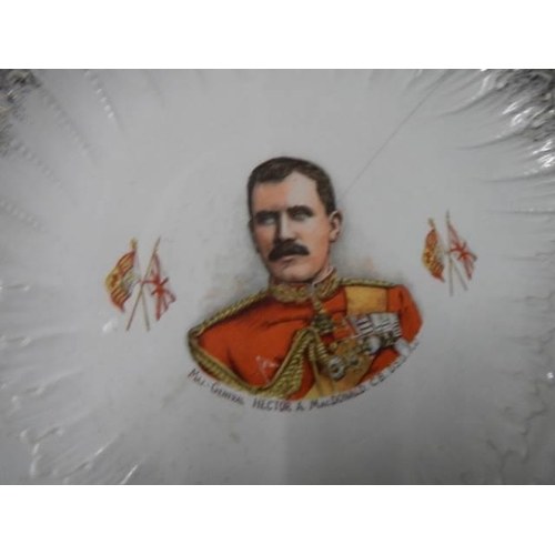 314 - Four collector's plates featuring military leaders, (one has crack).