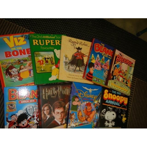 323 - A quantity of children's annuals including Rupert.