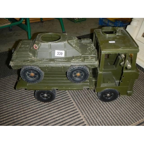 339 - An Action man toy military lorry and tank.