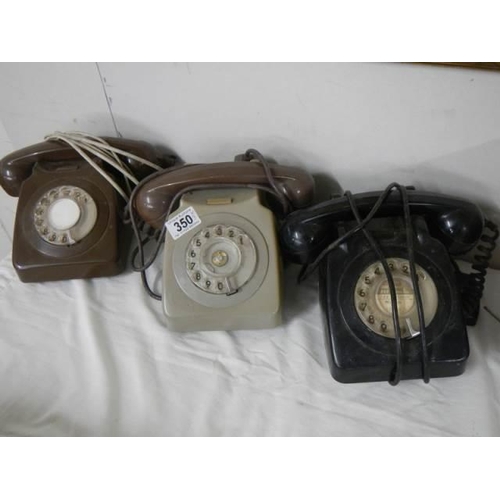 350 - Three vintage telephones.