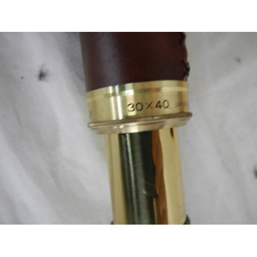 357 - A cased brass telescope, 30 x 40, marked Japan.