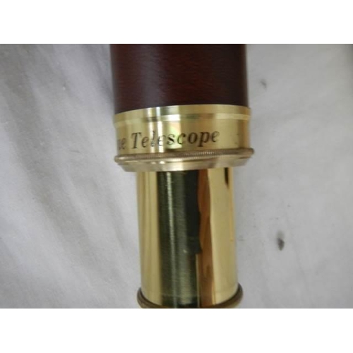 357 - A cased brass telescope, 30 x 40, marked Japan.