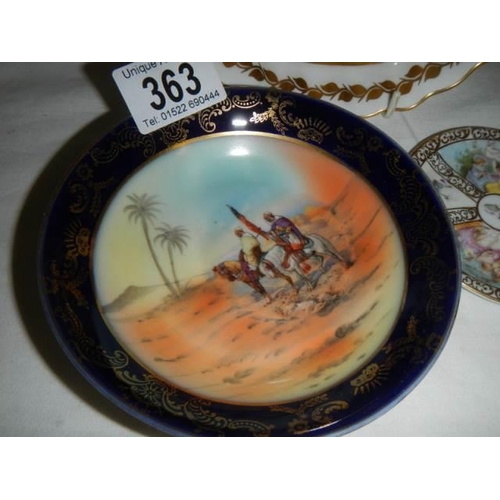 363 - Three porcelain dishes including one with desert scene.