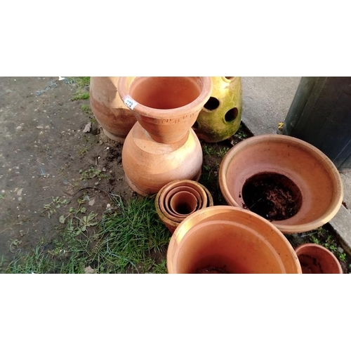 279 - A Large collection of terracotta Pots