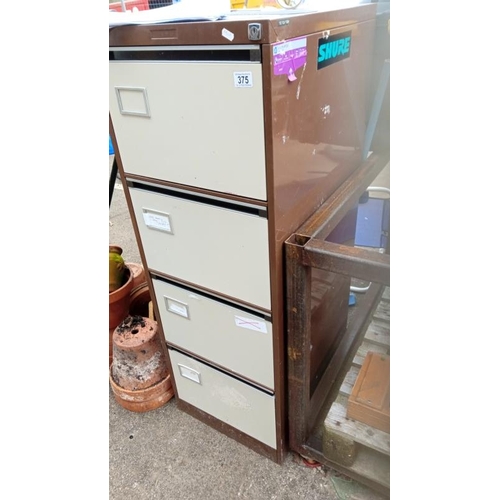 375 - A four drawer metal filing cab