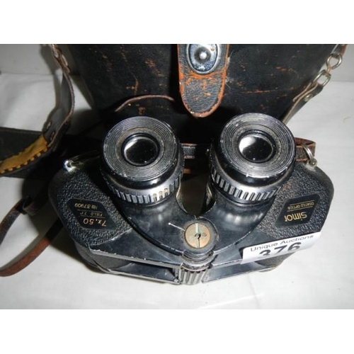 376 - A cased set of binoculars.