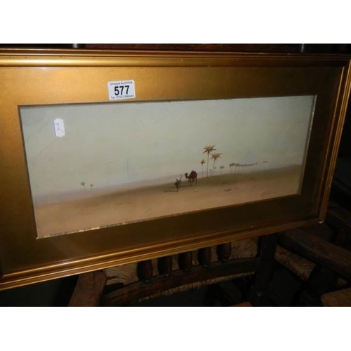 577 - A framed and glazed watercolour desert scene signed J F Canham 1912, COLLECT ONLY.