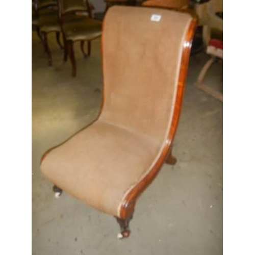 589 - An old nursing chair (needs attention to upholstery). COLLECT ONLY