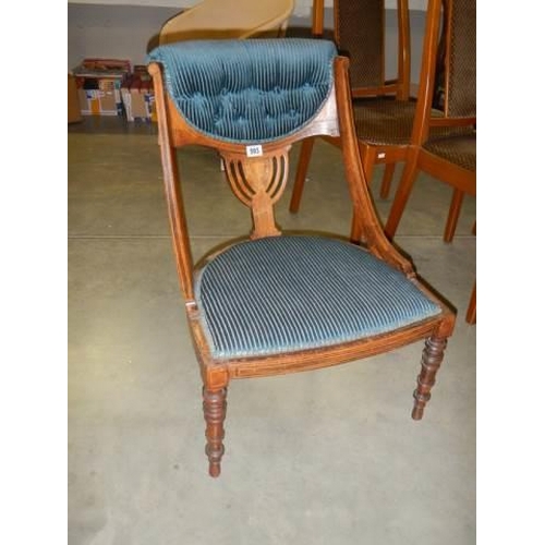 593 - An Edwardian mahogany inlaid nursing chair, COLLECT ONLY.