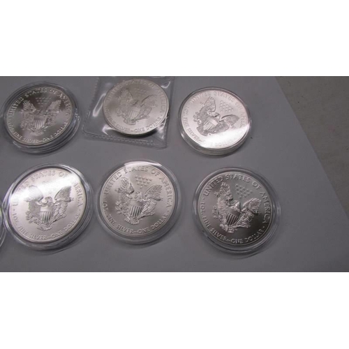 1109 - 10 1 oz .999 silver USA Eagels coins, various dates.