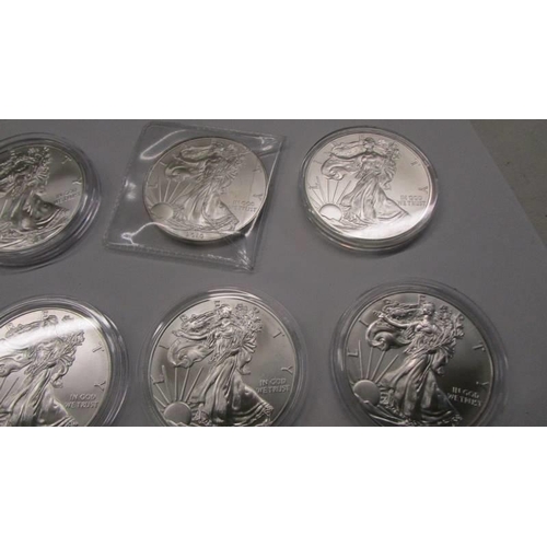 1109 - 10 1 oz .999 silver USA Eagels coins, various dates.