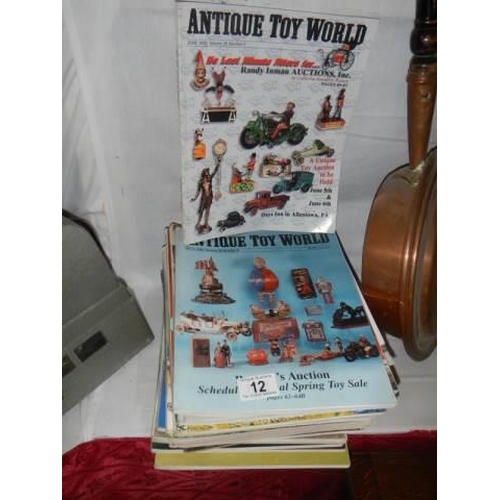 12 - A quantity of 'Antique Toy World' magazines.