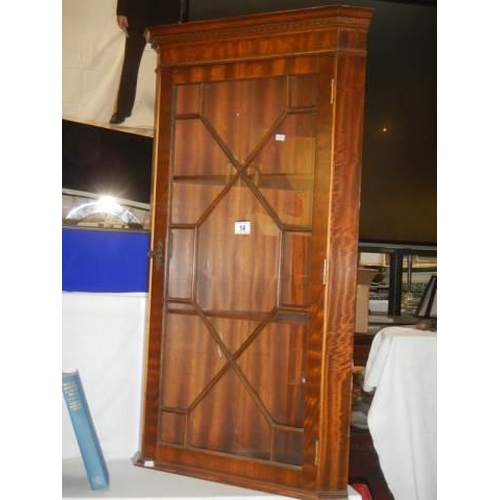 14 - A mahogany astragal glazed corner cabinet. COLLECT ONLY.