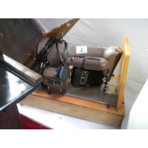 2 - A vintage Singer electric sewing machine, COLLECT ONLY.