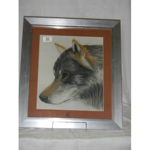 23 - A framed and glazed watercolour of a wolf head,