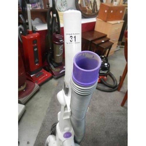 31 - A Hoover vacuum cleaner in working order, COLLECT ONLY.