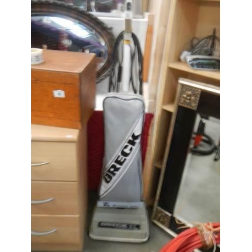 32 - An Oreck vacuum cleaner in working order, COLLECT ONLY.