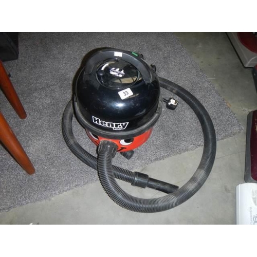 33 - A Henry vacuum cleaner in working order, COLLECT ONLY.