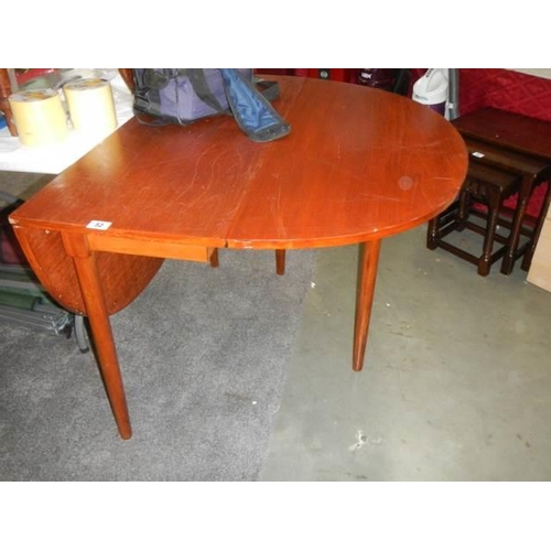 52 - A drop leaf table, COLLECT ONLY.