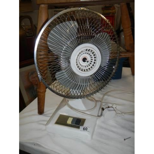 60 - A desk top fan.