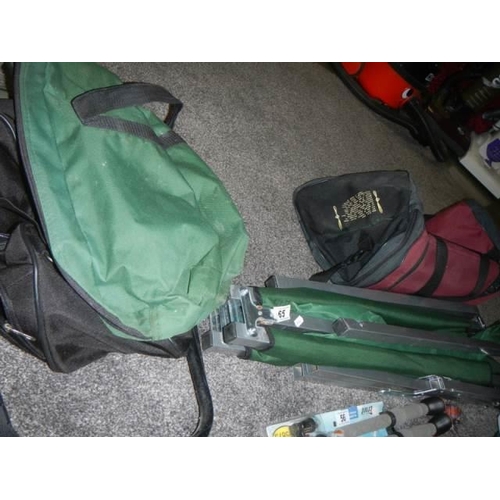 65 - A large holdall, folding chair & folding camp bed COLLECT ONLY.