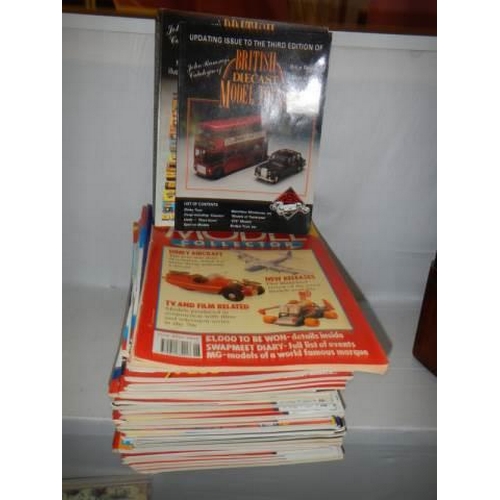 8 - A quantity of die cast collector's magazines.