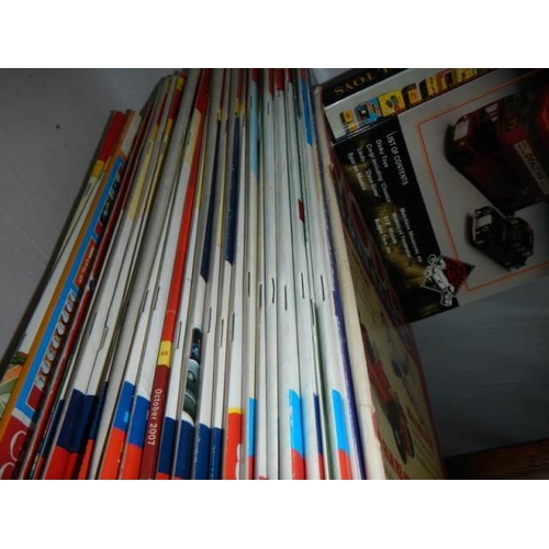 8 - A quantity of die cast collector's magazines.