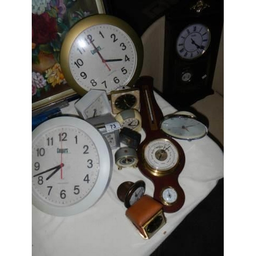 73 - A mixed lot of clocks and barometers.