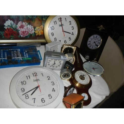 73 - A mixed lot of clocks and barometers.