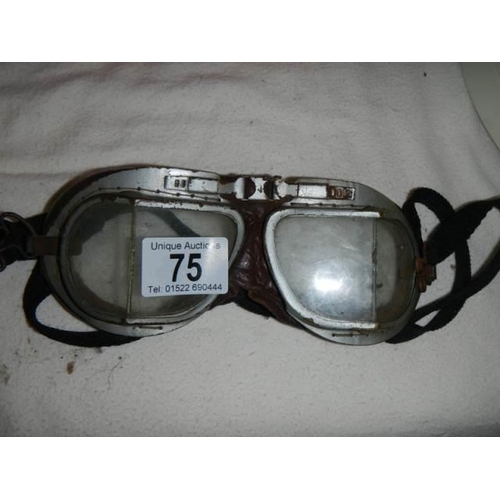 75 - A pair of vintage goggles.