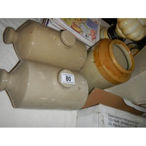 80 - Two stoneware hot water bottles and a stoneware jar.