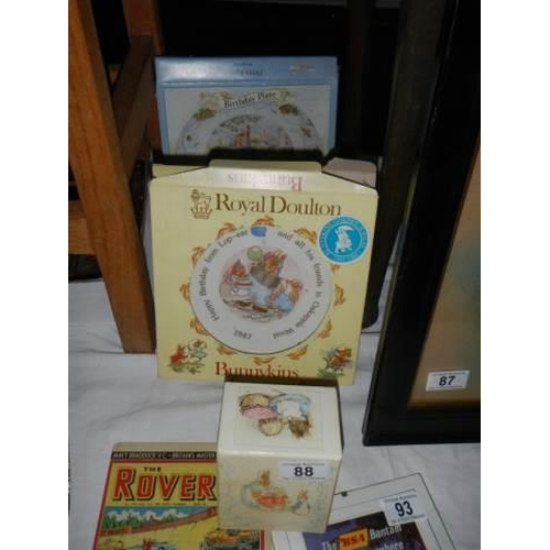 88 - A boxed Royal Doulton Beatrix Potter dish, two other items and Beatrix Potter videos.