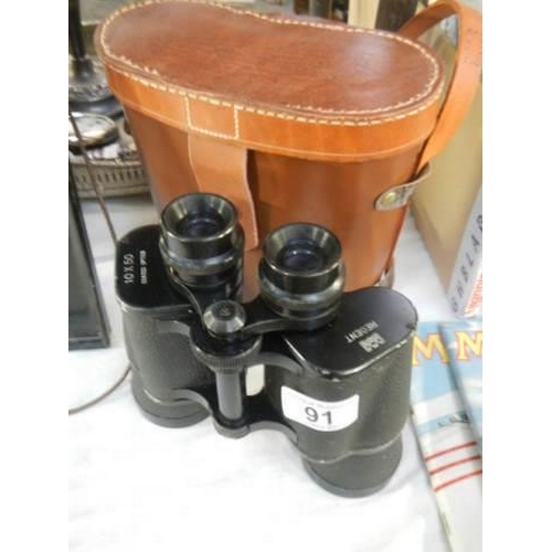 91 - A cased pair of binoculars.