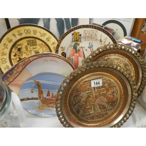 144 - A collection of Egyptian scene collector's plates.