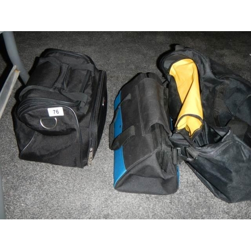 76 - A quantity of various holdalls etc.,