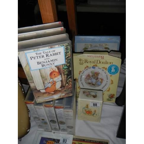 88 - A boxed Royal Doulton Beatrix Potter dish, two other items and Beatrix Potter videos.