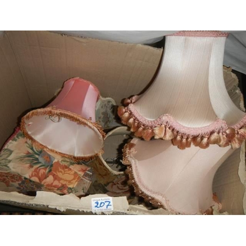 207 - A box of assorted lamp shades.