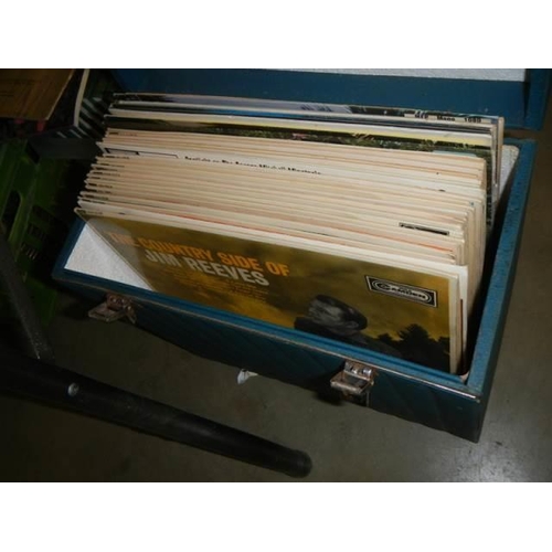 214 - A record case and LP records.