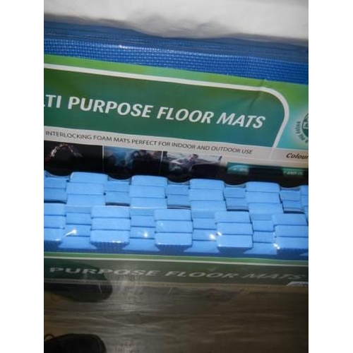 218 - A pack of multi-purpose floor mats, COLLECT ONLY.